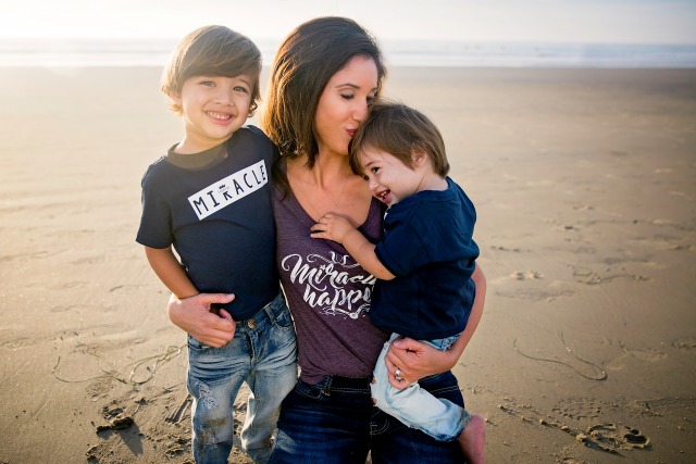 Nadine with her 2 sons on the beach