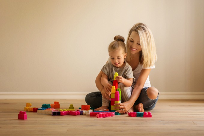 Jessica and Sophie playing with blocks