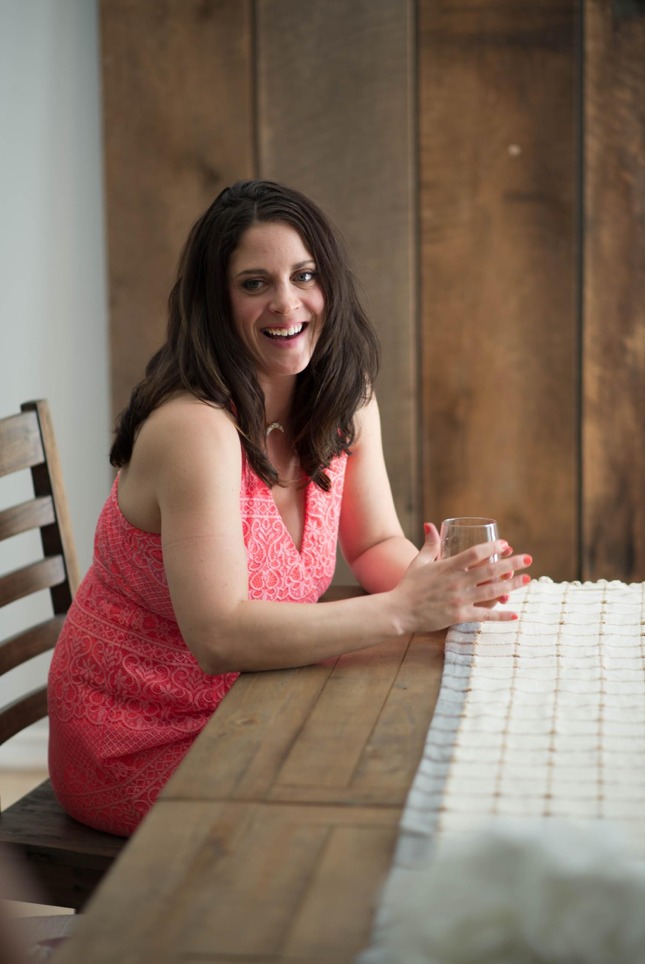 Lynnaya sitting at a table