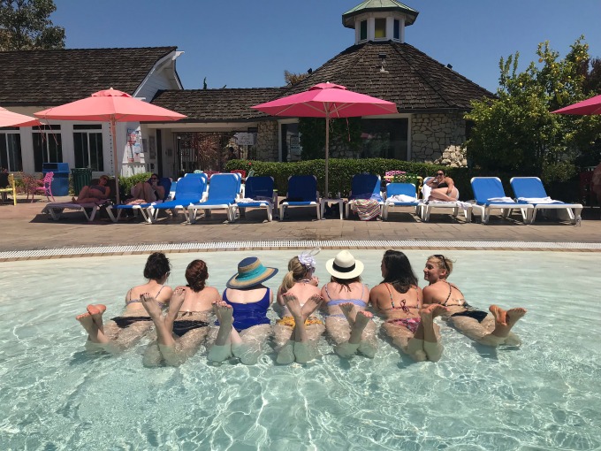 Caitlin and her friends in the pool