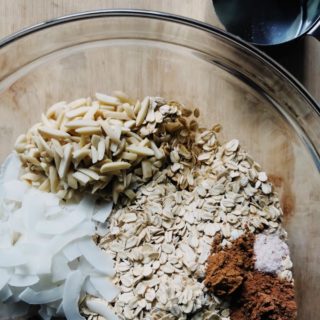 This quick and easy coconut pumpkin spice granola recipe not only fills your home (and belly) with the smell of warm spice and toasty coconut but it’s only 10 ingredients, vegan, gluten-free, refined sugar-free, and a one-bowl cleanup job.