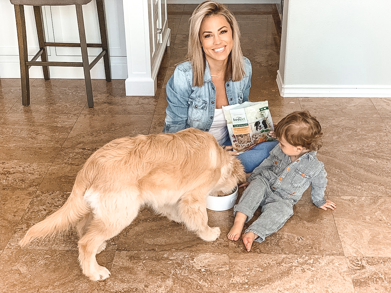 Ryder eating Freshpet food with Jessica and Jake watching 