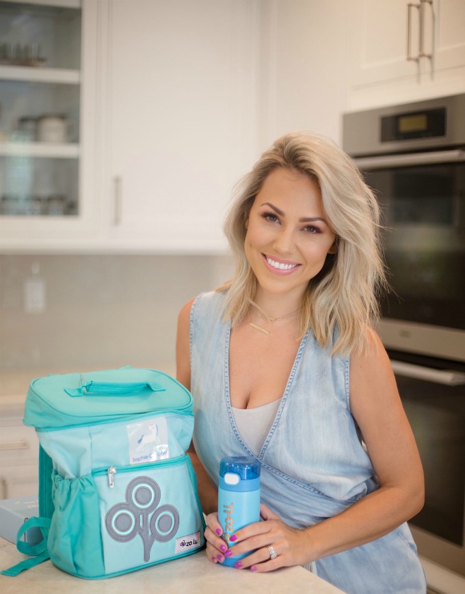 Jessica Hall in the kitchen with a lunchbox