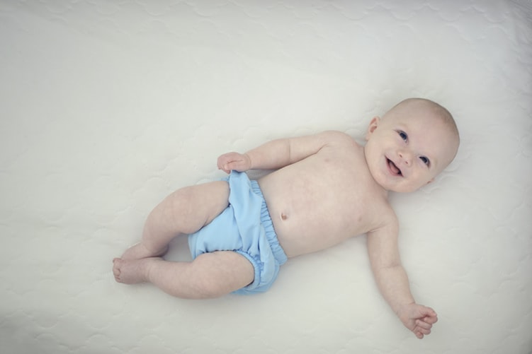 baby with blue diaper