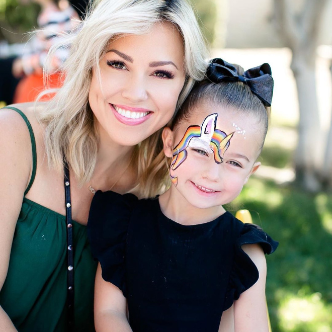 Mom and Daughter with rainbow unicorn face paint