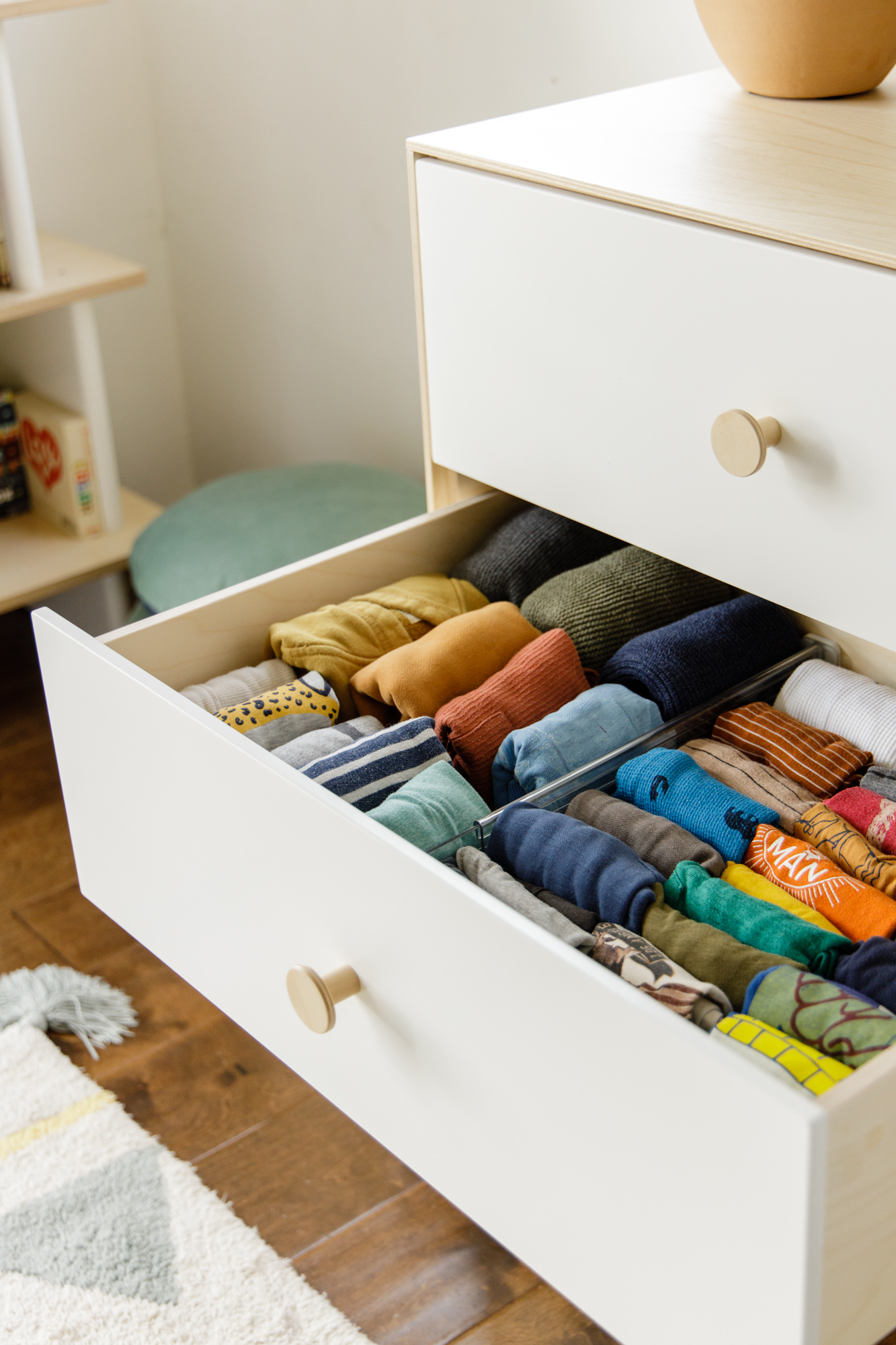 Clothes folded neatly in drawers