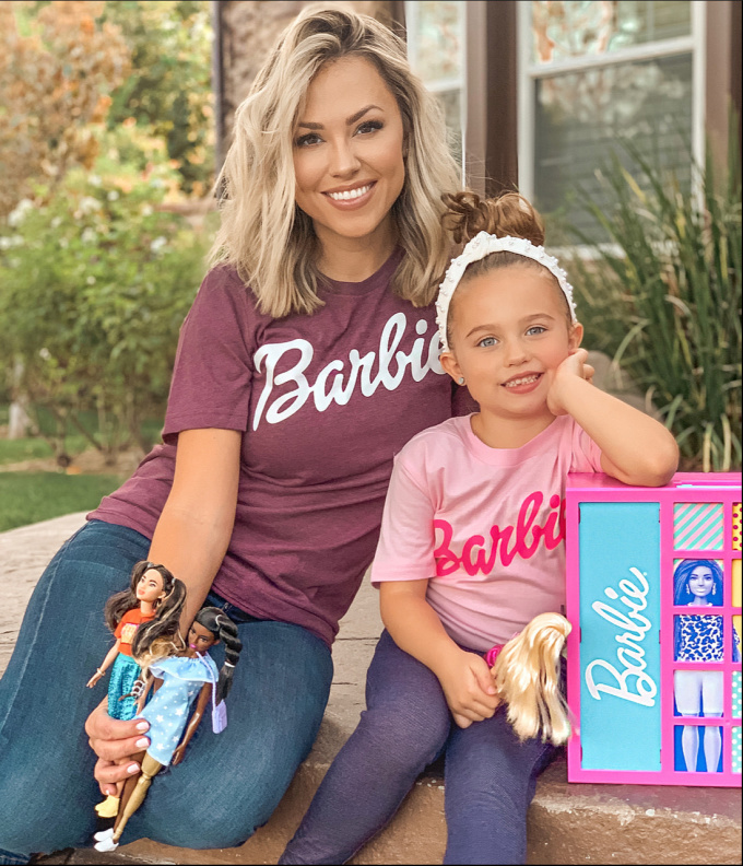 mom and daughter with Barbie Fashionistas dolls