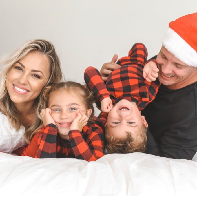 family in matching Christmas pajamas