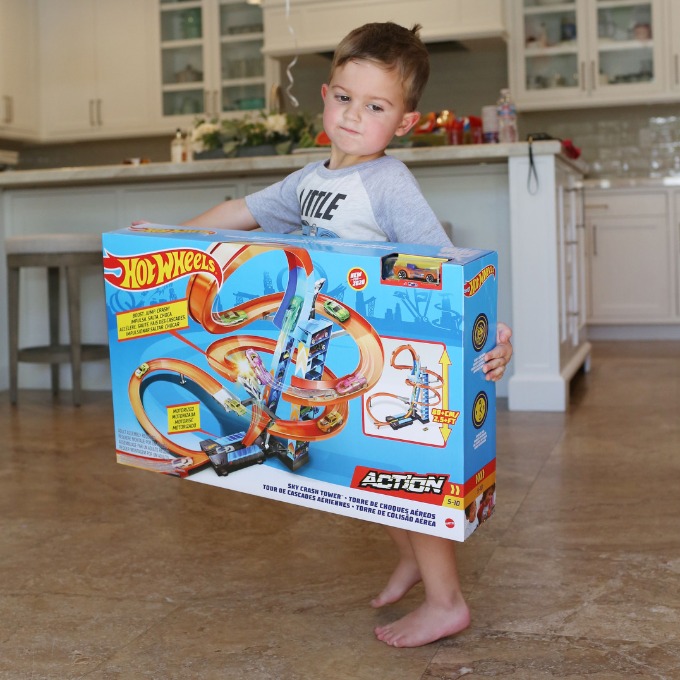 Jake holding Hot Wheels Track