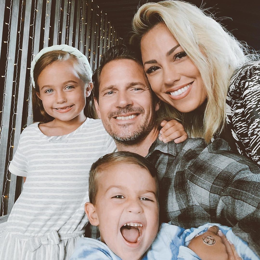 Jessica Hall with her husband, daughter, and son dressed in fall clothes.