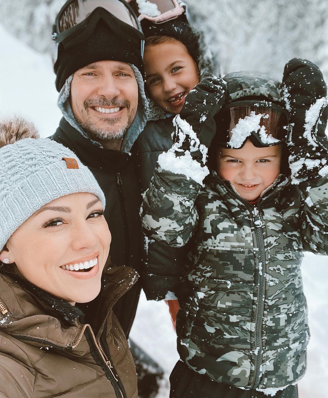 Jessica Hall and family in snow gear on the ski slopes for Chrimstas.