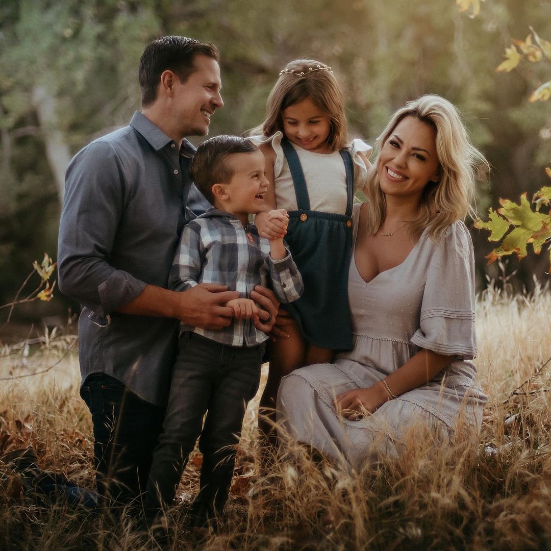 Jessica Hall and Family outside in the fall.