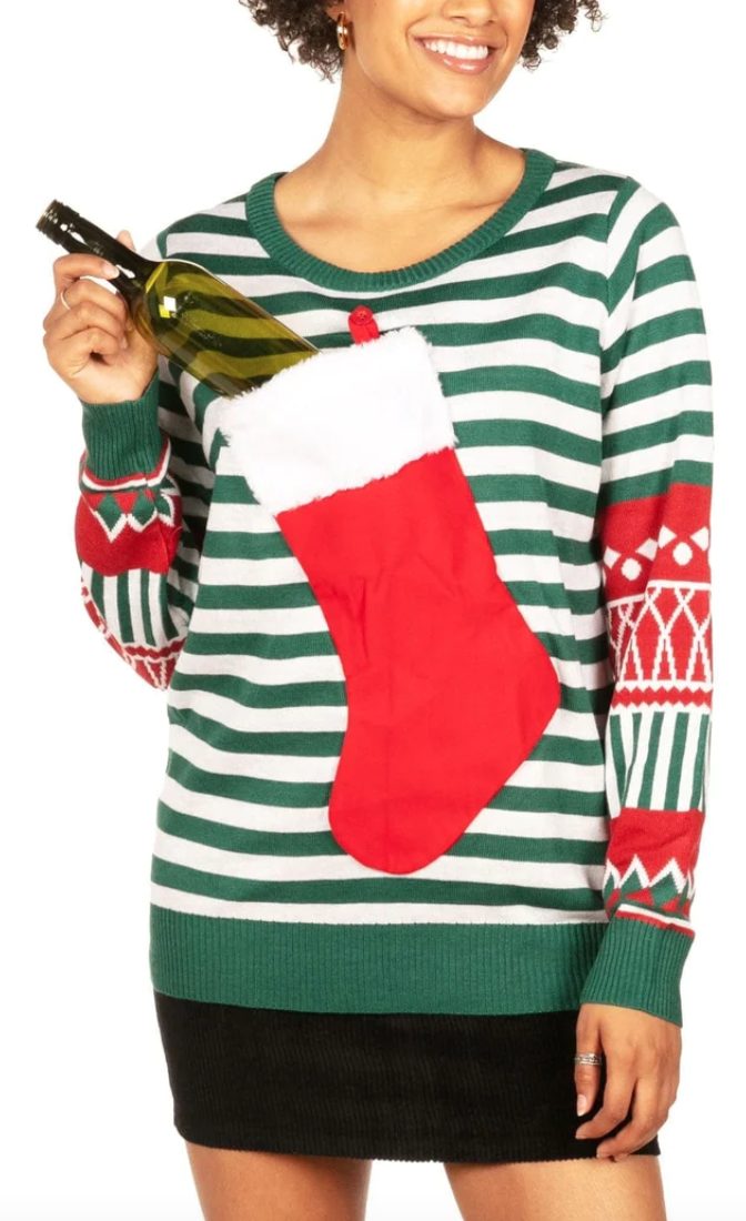 Christmas Sweater with a stocking that holds a bottle of wine.